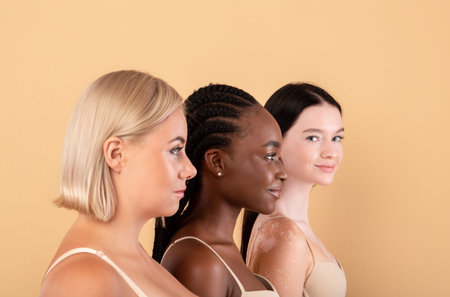 Three women with different skin tones